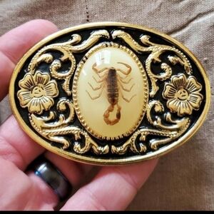 New scorpion belt buckle approx. 3.75 " glows in dark.
